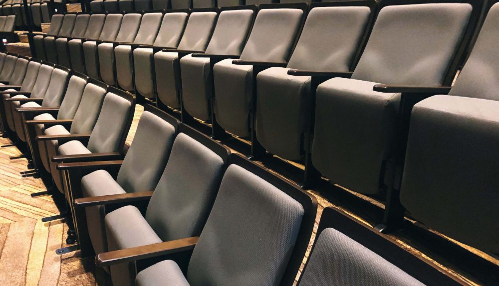 row-of-empty-seat-in-theater-hall-auditorium-2022-11-07-23-43-09-utc